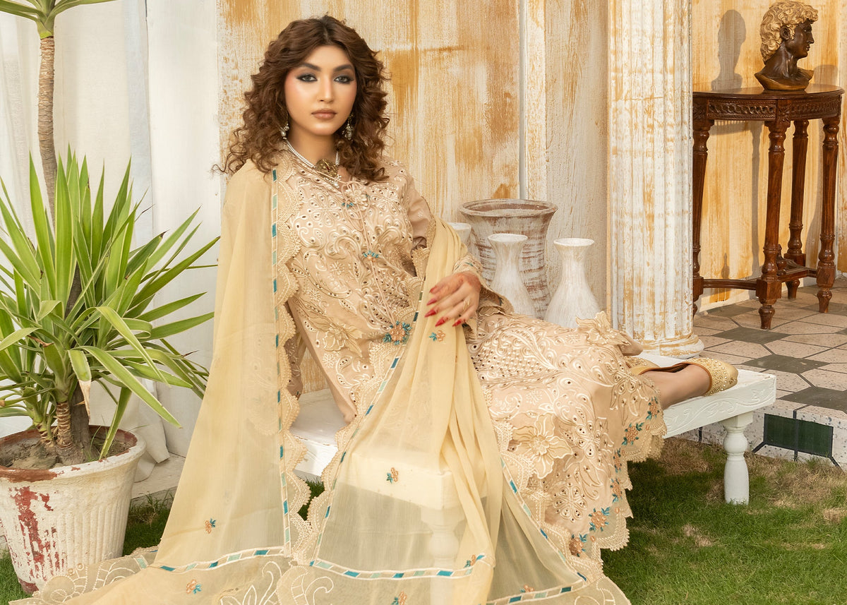 Beige embroidered lawn suit styled with jewelry