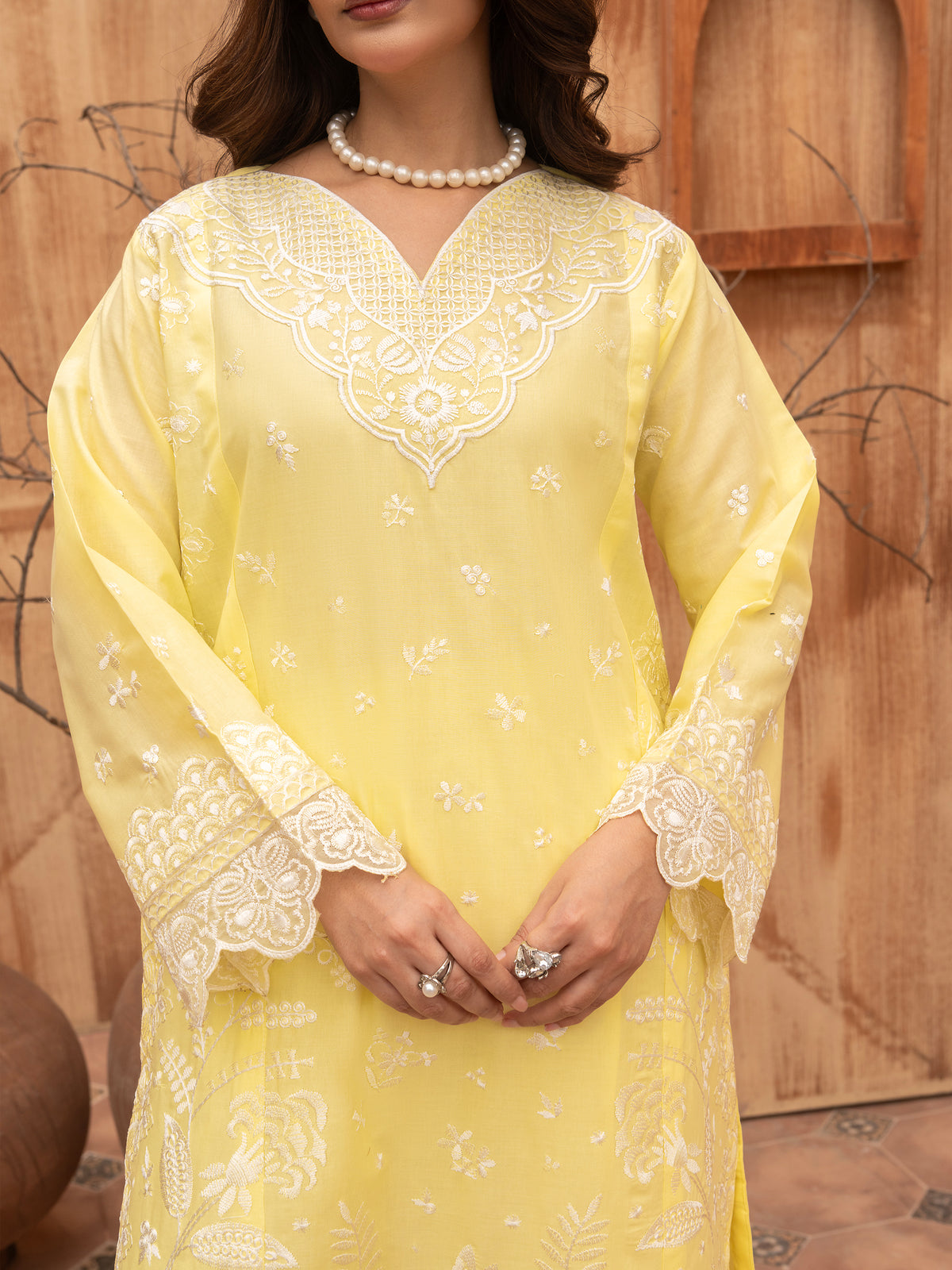 Lemon yellow embroidered lawn suit styled with pearls