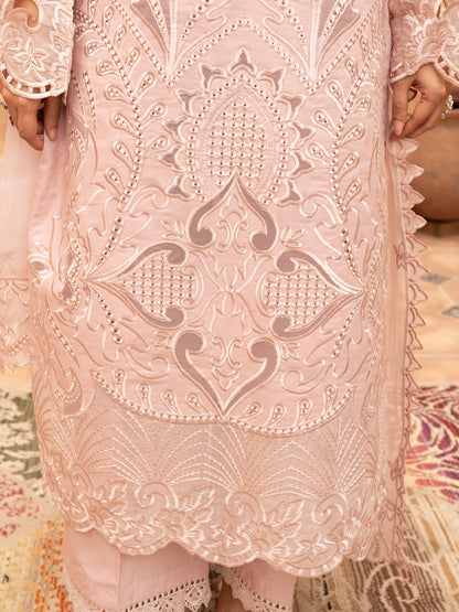 Detailed front embroidery of pink lawn suit with floral and paisley motifs