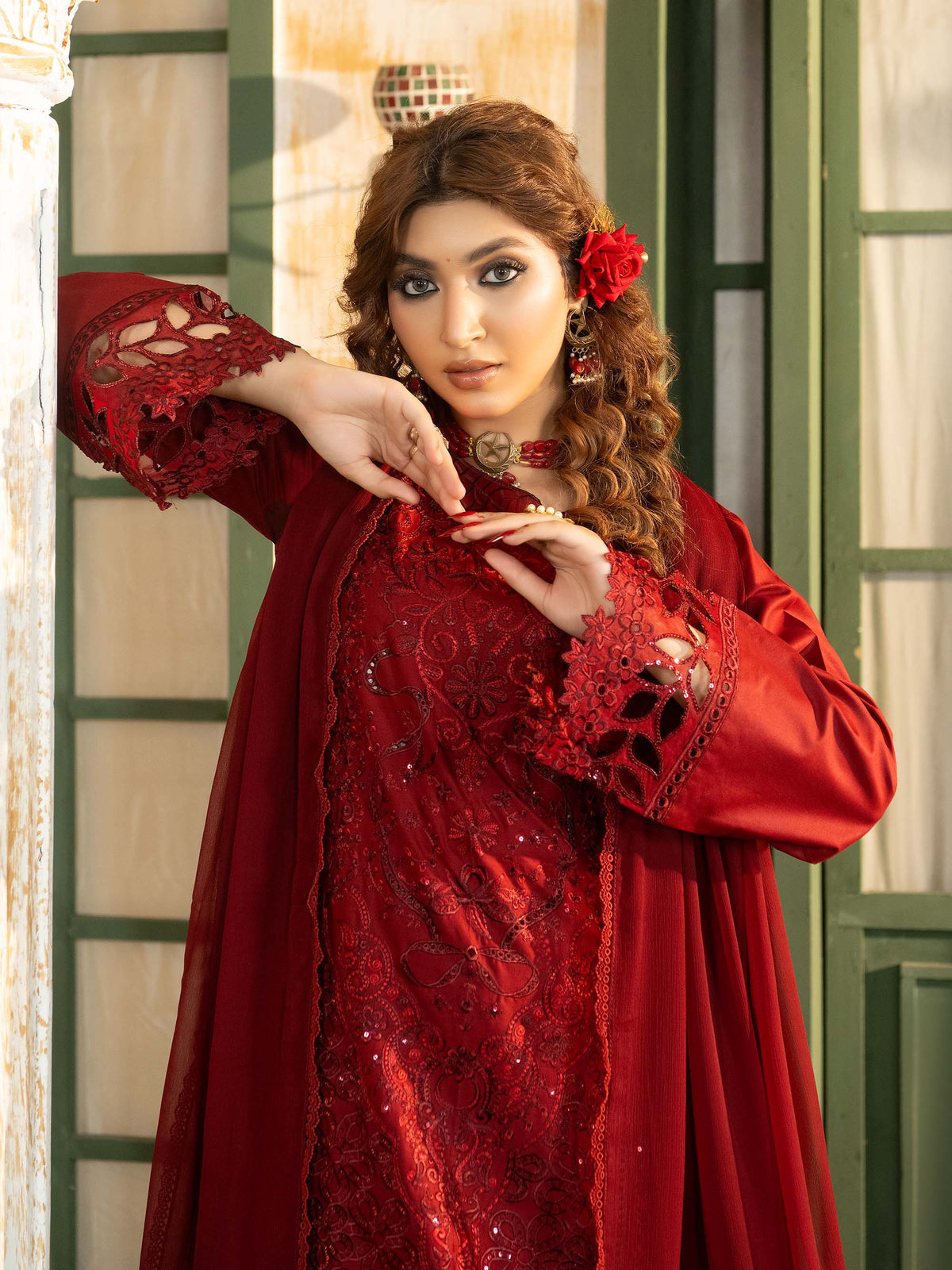 Portrait of model wearing embroidered lawn suit