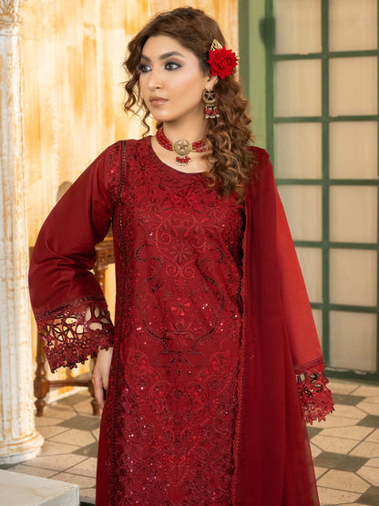 Maroon lawn suit styled with jewelry and rose hairpiece