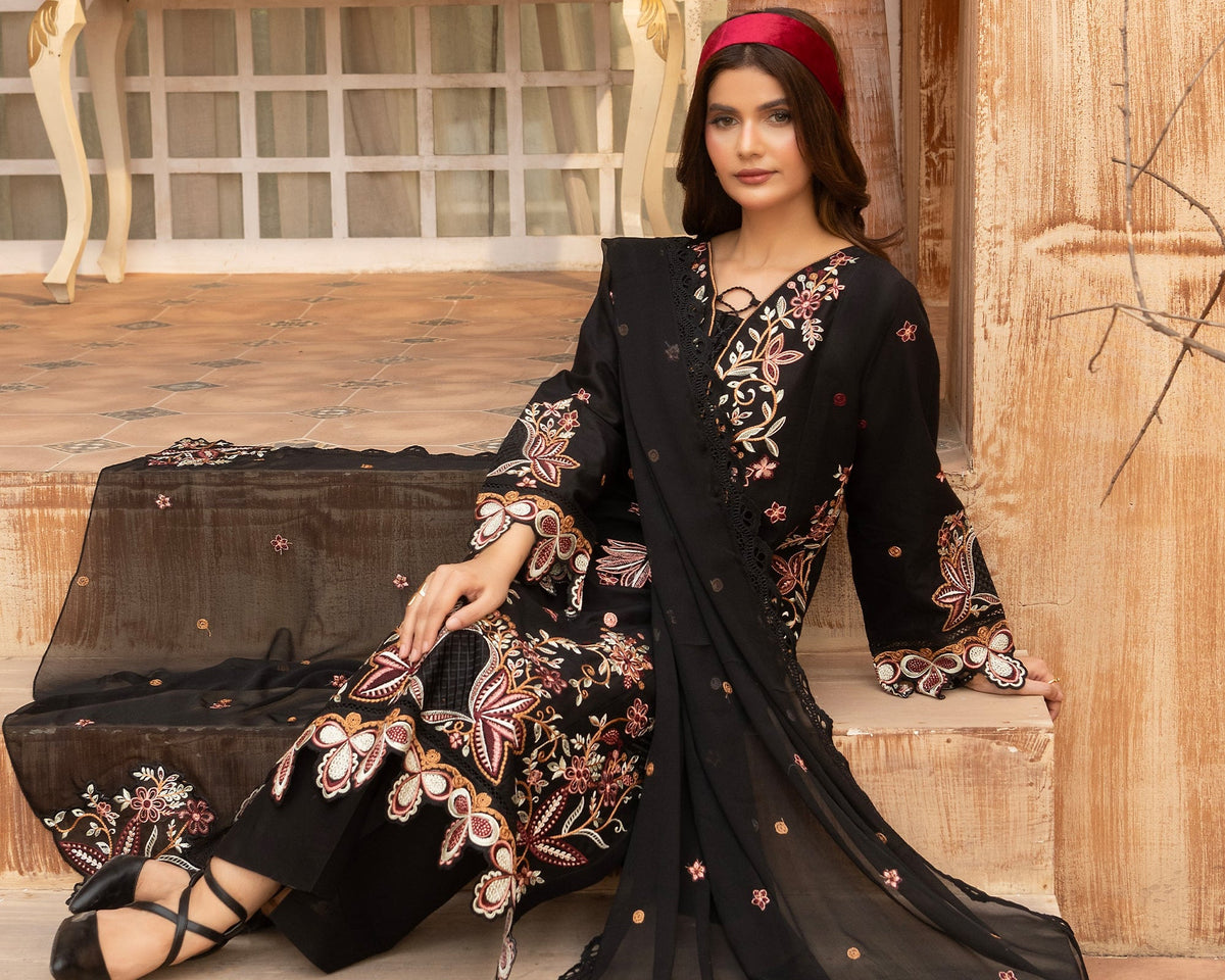 Black Embroidered Suit (seated, floral motif, red headband)