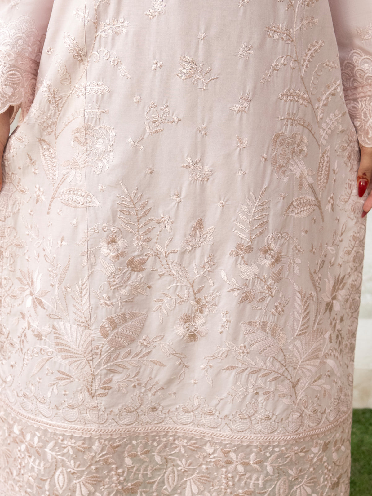 Close-up of embroidered hem on lawn embroidery dress