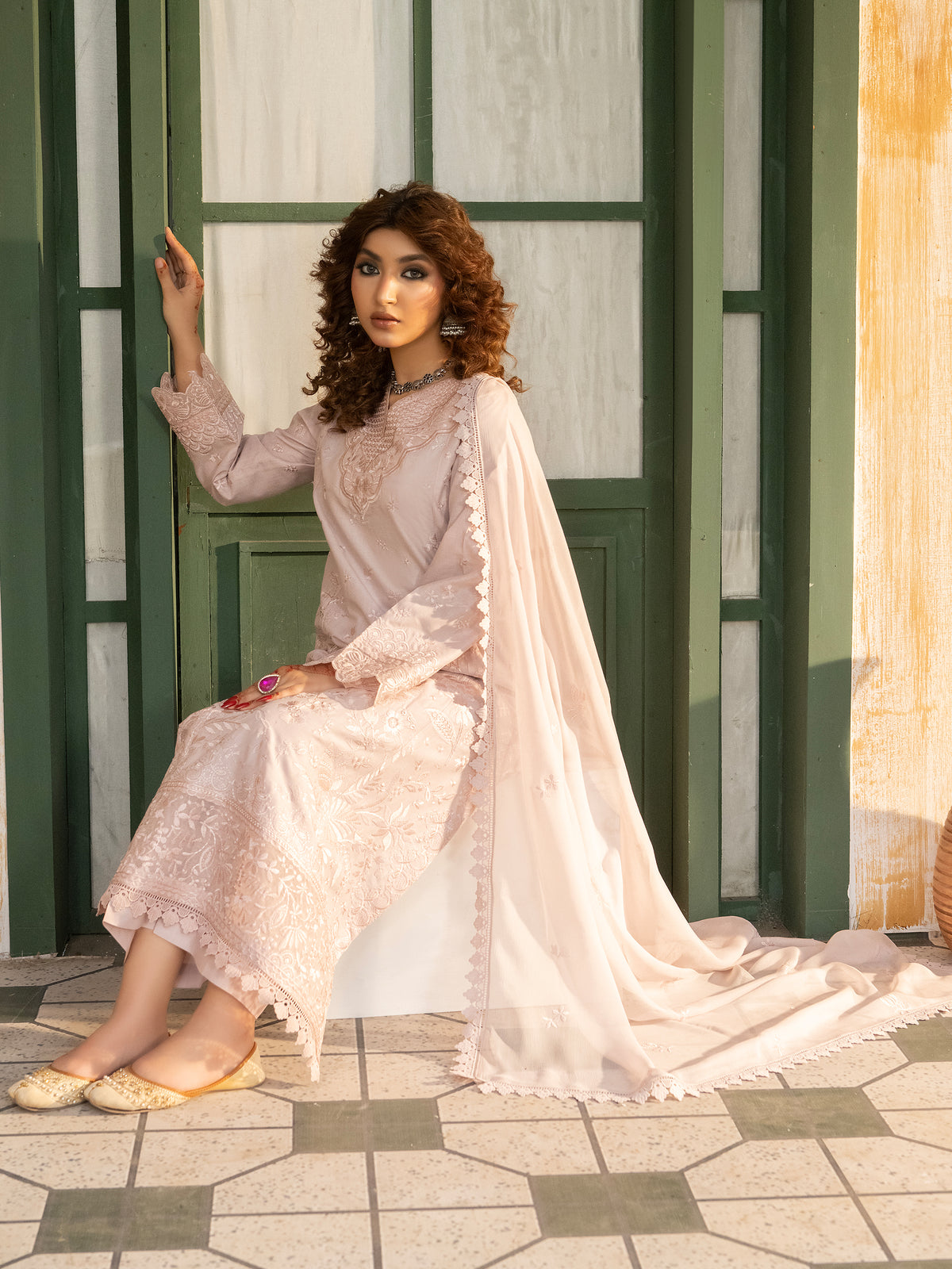 Beige lawn embroidery dress with chiffon dupatta, seated
