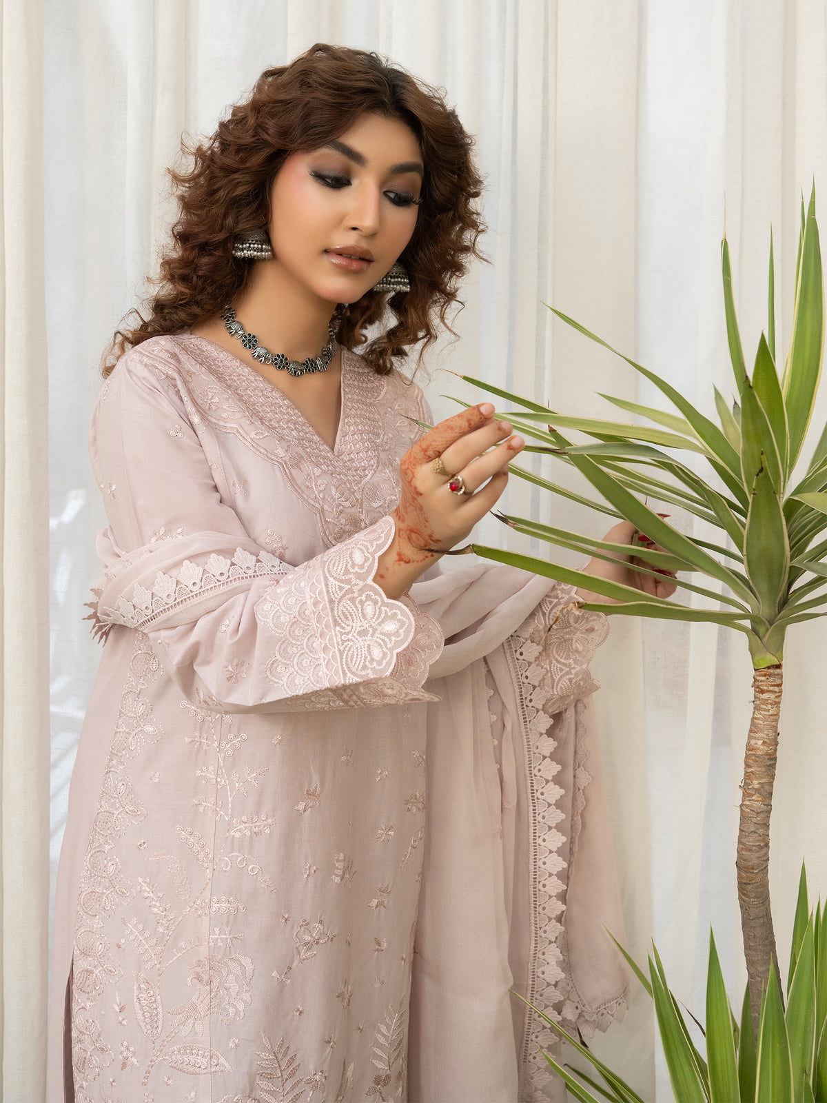 Beige lawn embroidery dress styled with jewelry