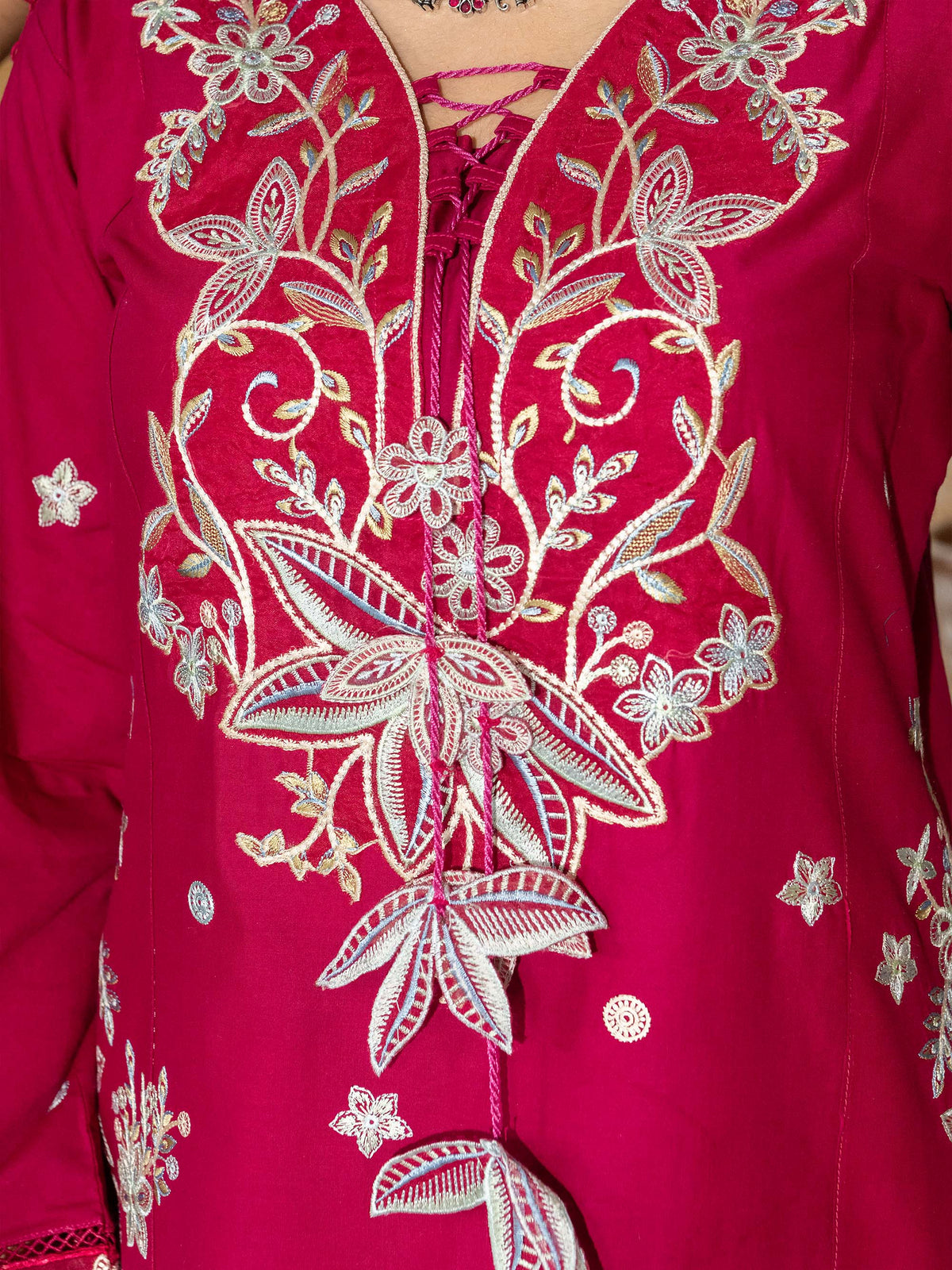 Close-up of back embroidery on hot pink lawn suit