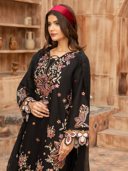 Close-up of sleeve embroidery on black lawn suit