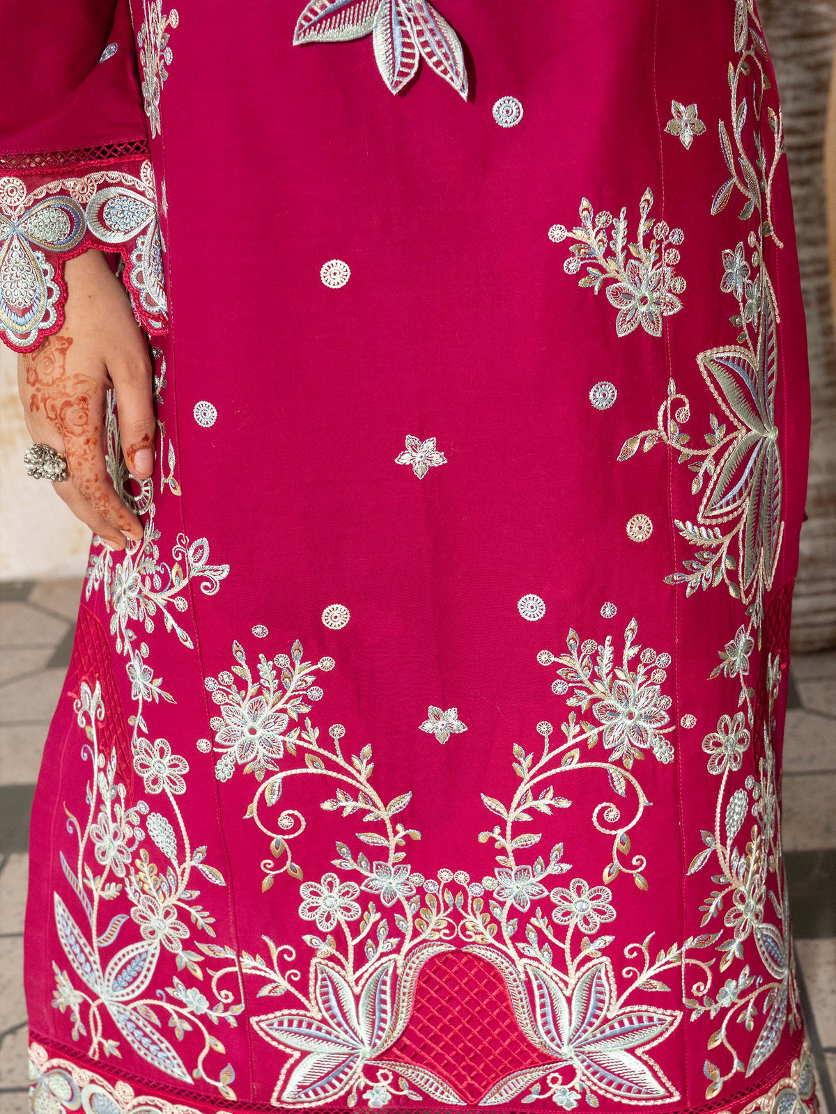 Close-up of sleeve embroidery on lawn suit