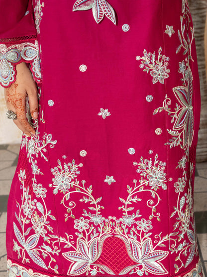 Close-up of sleeve embroidery on lawn suit