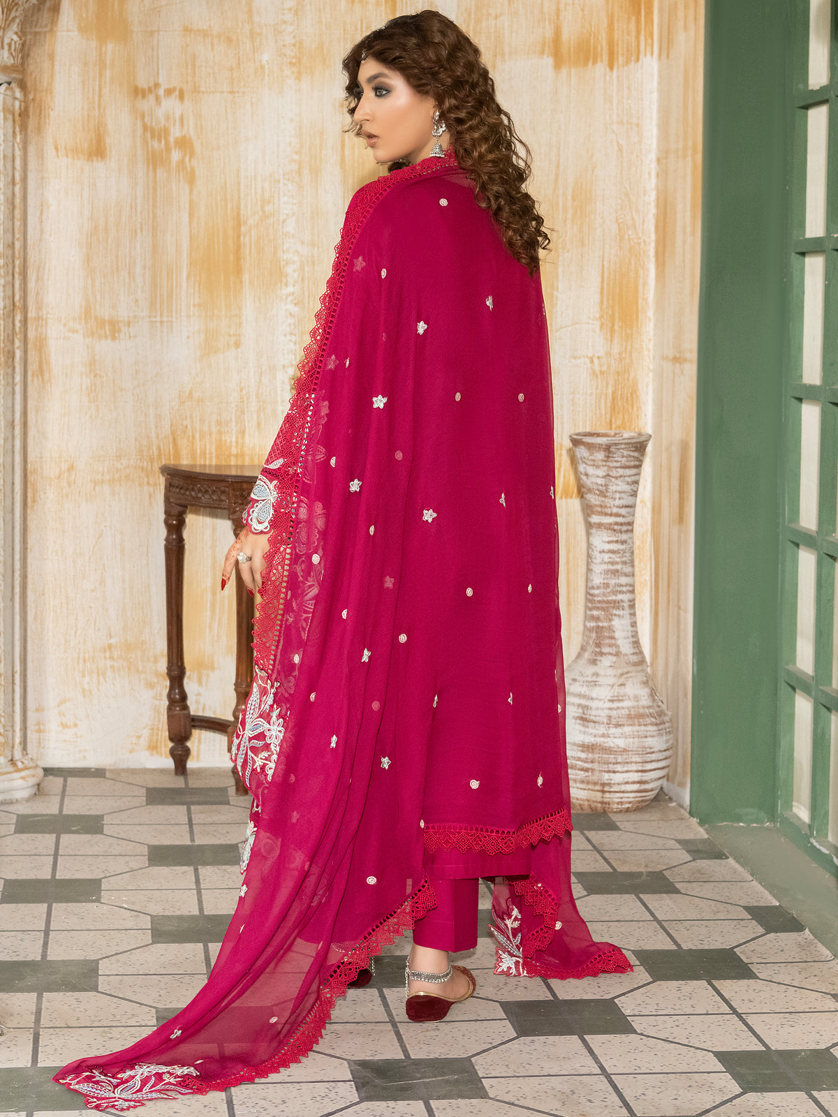 Hot pink embroidered lawn suit styled with jewelry